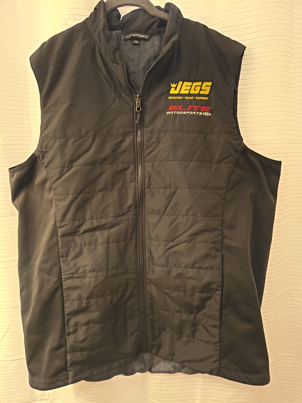 Port Authority Black Quilted Sleeveless Vest with Yellow Logo